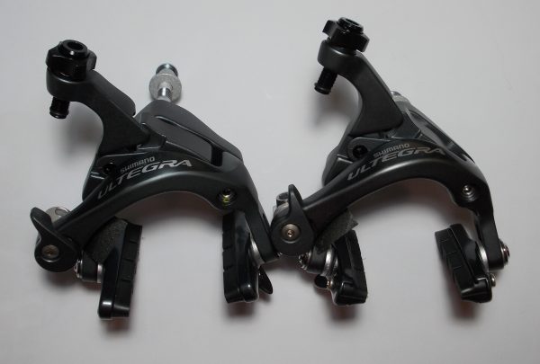 KOČNICA CESTNA SHIMANO ULTEGRA BR-6800, PREDNJA I ZADNJA, SUNKEN NUT CS-51 10.5MM UKLJ. ADD. 12.5/18/27/32MM NUT, KOČIONA OBLOGA R55C4, IND.PACK